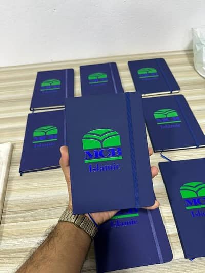 Note book diary comapny branding logo printing pen wallcloks keychain – Other Services